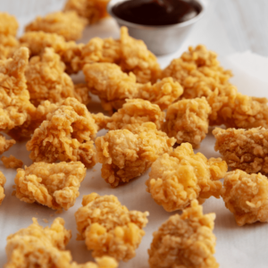 POPCORN CHICKEN BITES CN LABEL BREADED 20LB